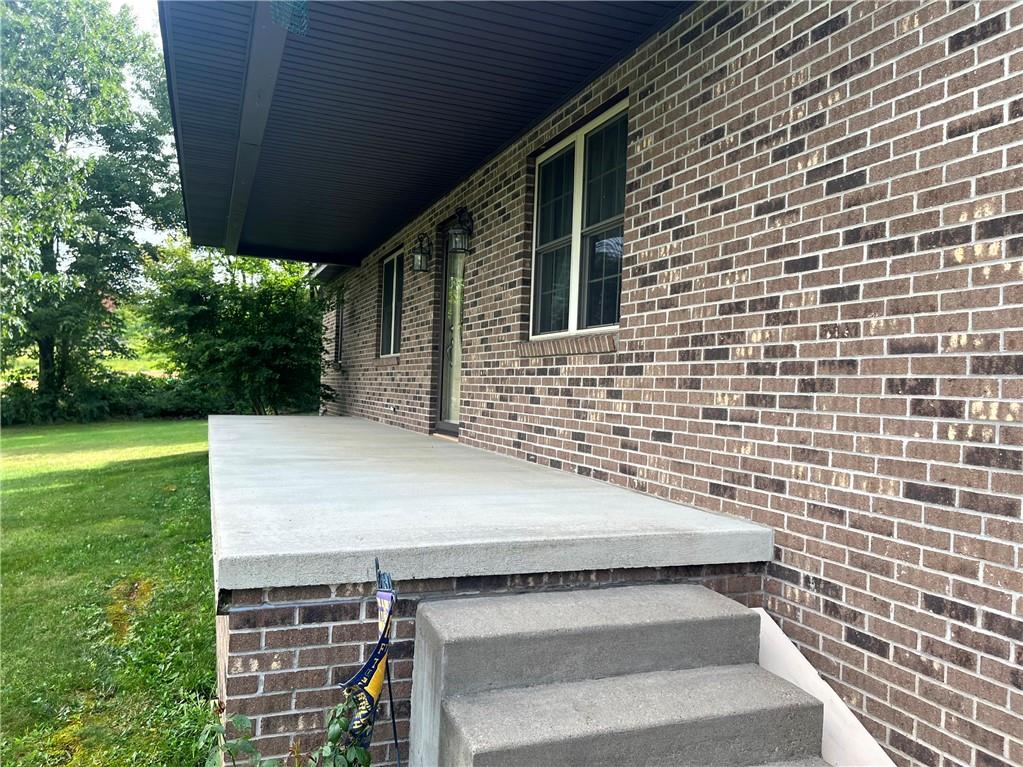 75 Cave Street Fairchance, PA 15436 - Photo 2 of 36 a view of a backyard with a garden