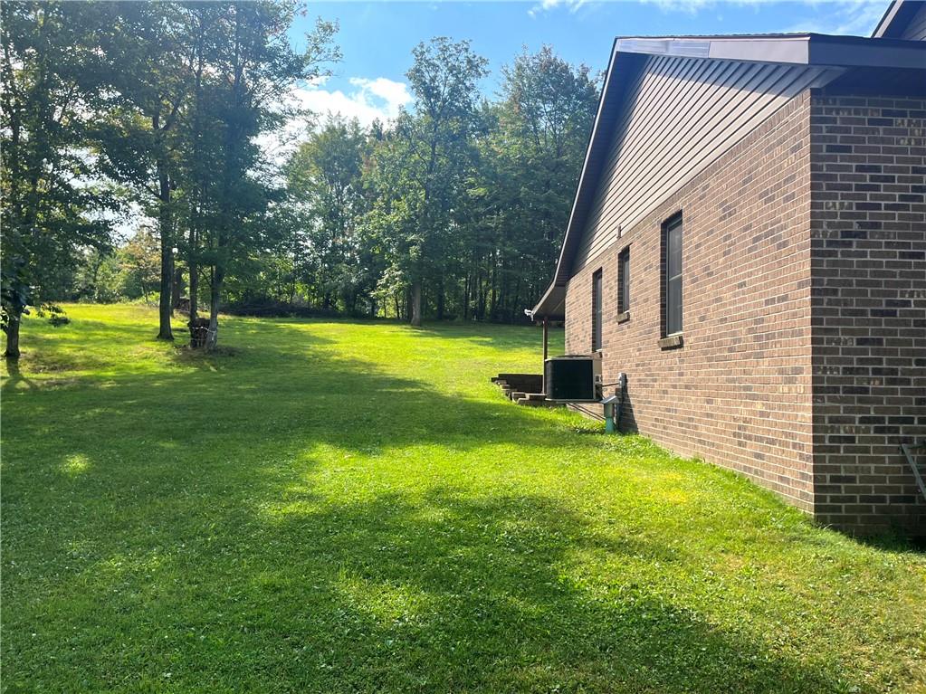 75 Cave Street Fairchance, PA 15436 - Photo 28 of 36 a front view of a house with a yard