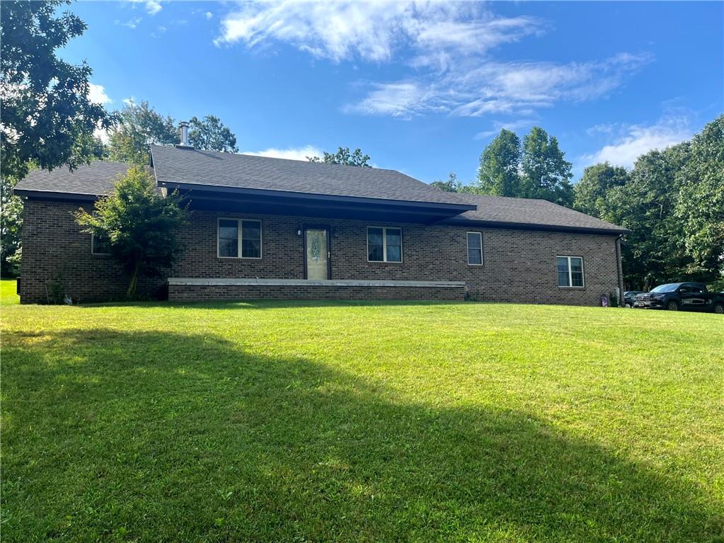 75 Cave Street Fairchance, PA 15436 - Photo 35 of 36 a front view of a house with garden