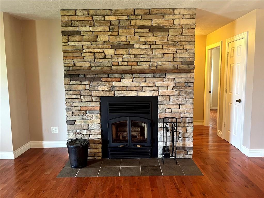 75 Cave Street Fairchance, PA 15436 - Photo 5 of 36 a living room with a fireplace