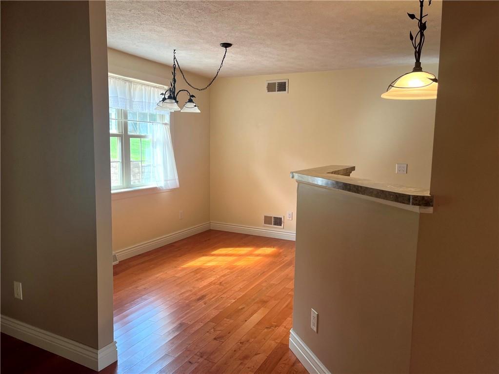 75 Cave Street Fairchance, PA 15436 - Photo 10 of 36 a view of a room with window and wooden floor