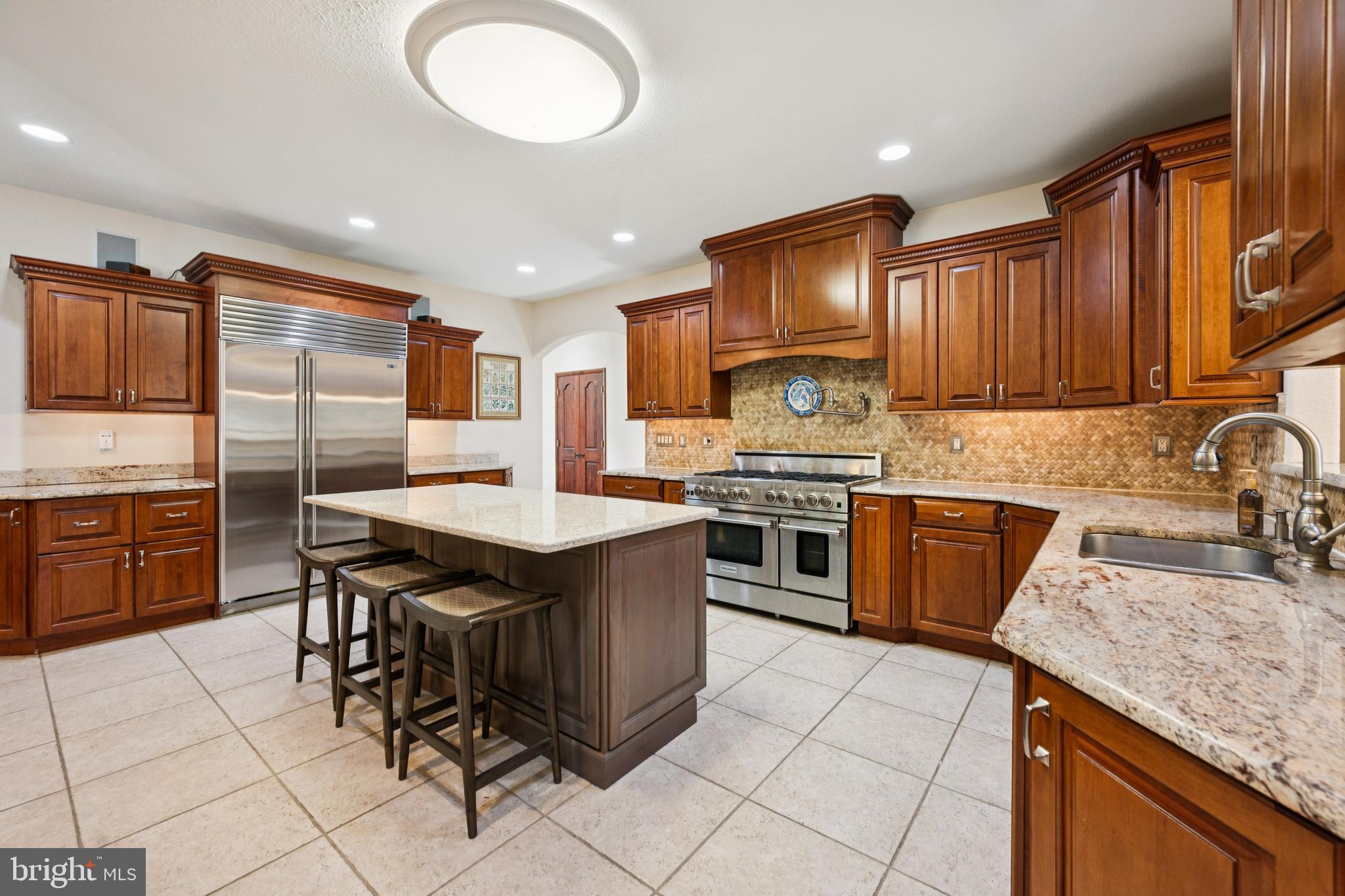 18 Lansbrook Court Sewell, NJ 08080 - Photo 11 of 44 a kitchen with stainless steel appliances granite countertop a stove top oven a sink dishwasher and cabinets