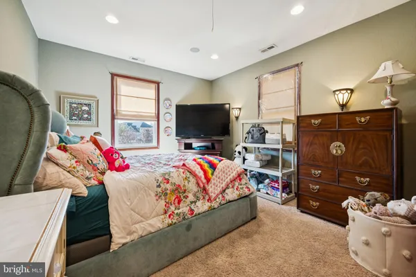 a living room with a couch and a flat screen tv