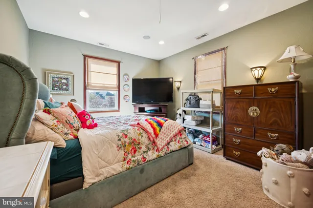 a living room with a couch and a flat screen tv