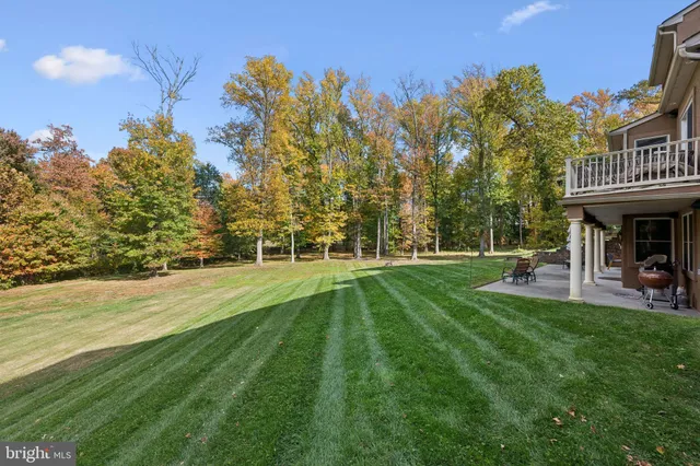 a view of a house with a big yard