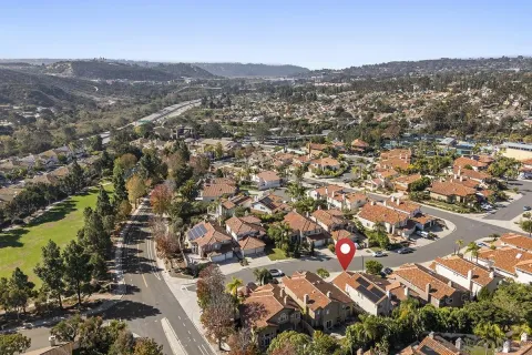 an aerial view of a city with lots of residential buildings