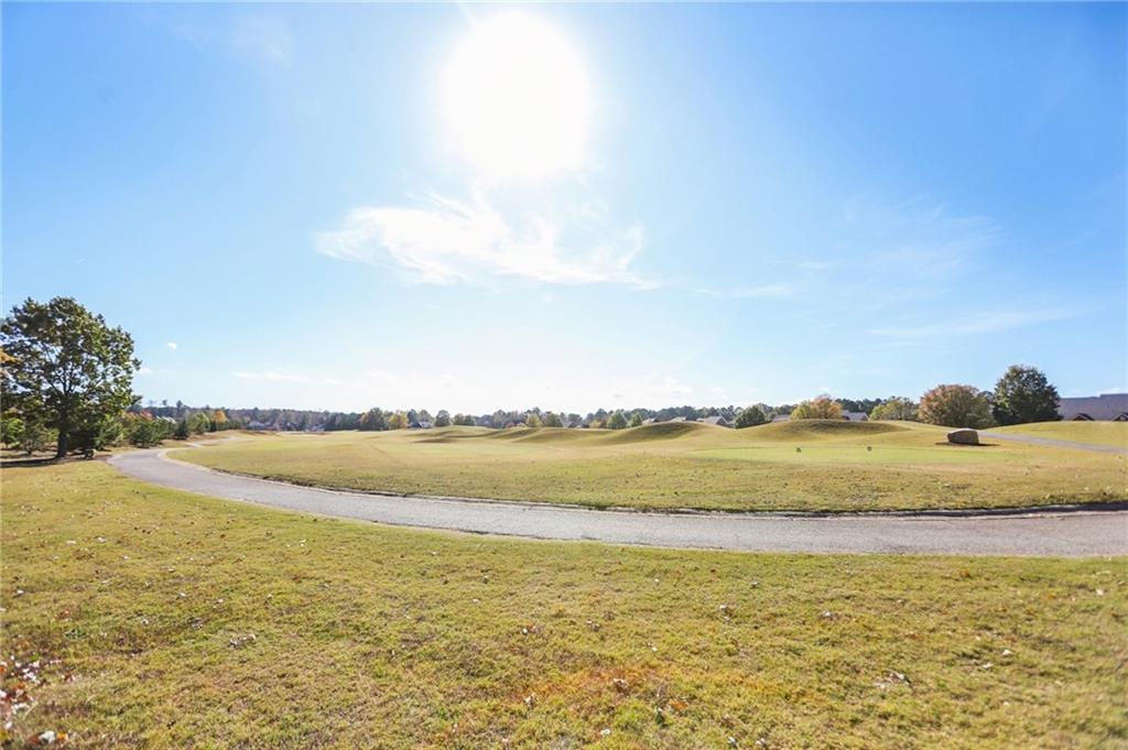3154 Alhambra Circle Hampton, GA 30228 - Photo 32 of 33 a view of an ocean and beach