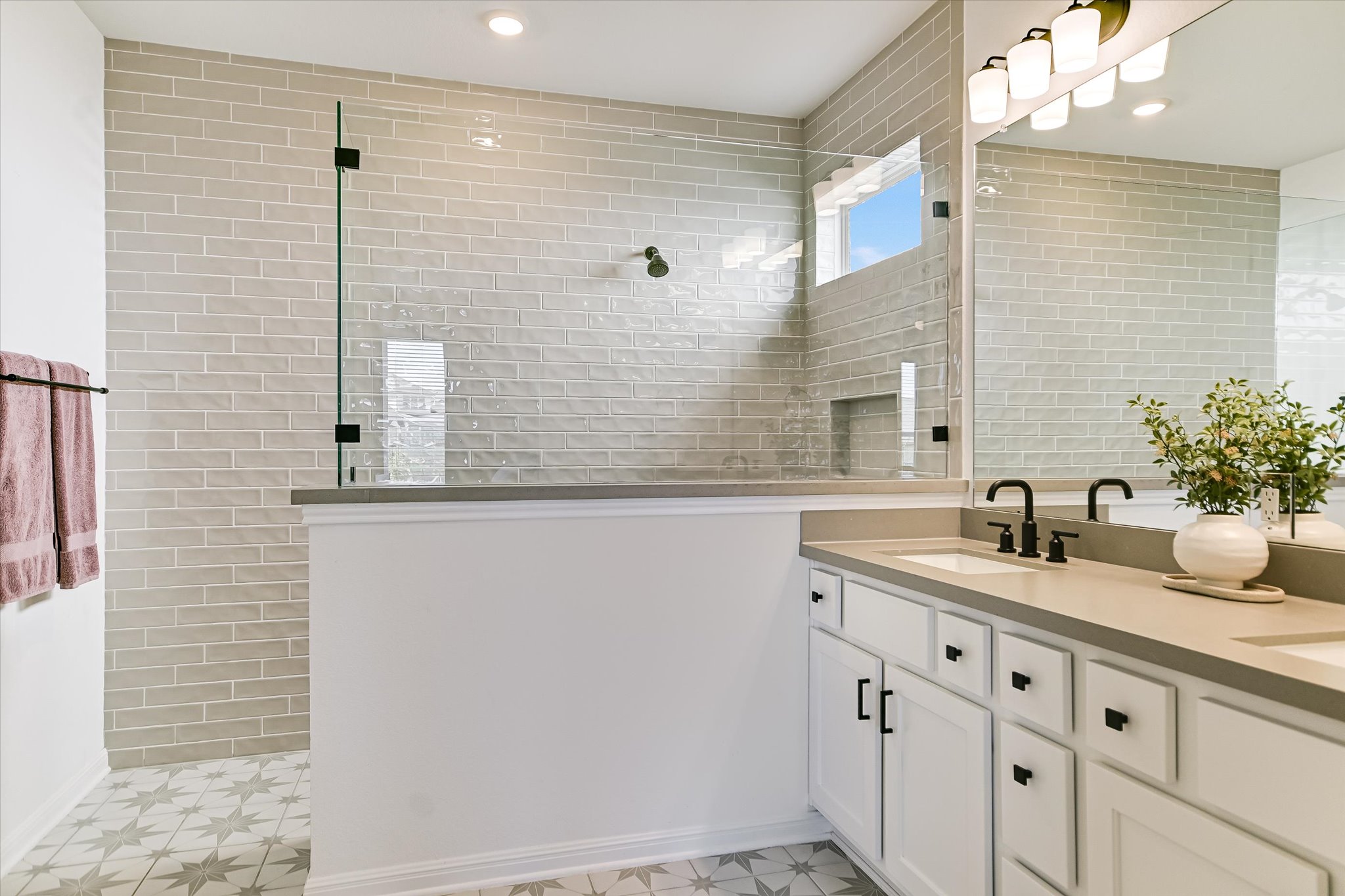 1928 Varese Path Leander, TX 78641 - Photo 10 of 31 a bathroom with a granite countertop sink and a mirror