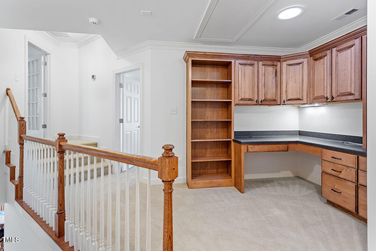 7342 Fontana Ridge Lane Raleigh, NC 27613 - Photo 15 of 26 a view of walk in closet with empty racks