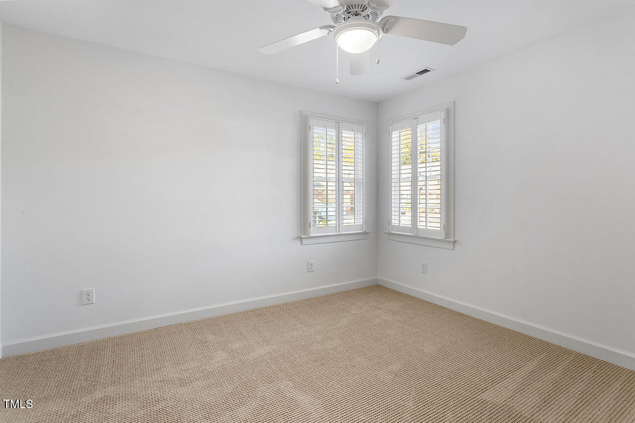 7342 Fontana Ridge Lane Raleigh, NC 27613 - Photo 20 of 26 an empty room with a window