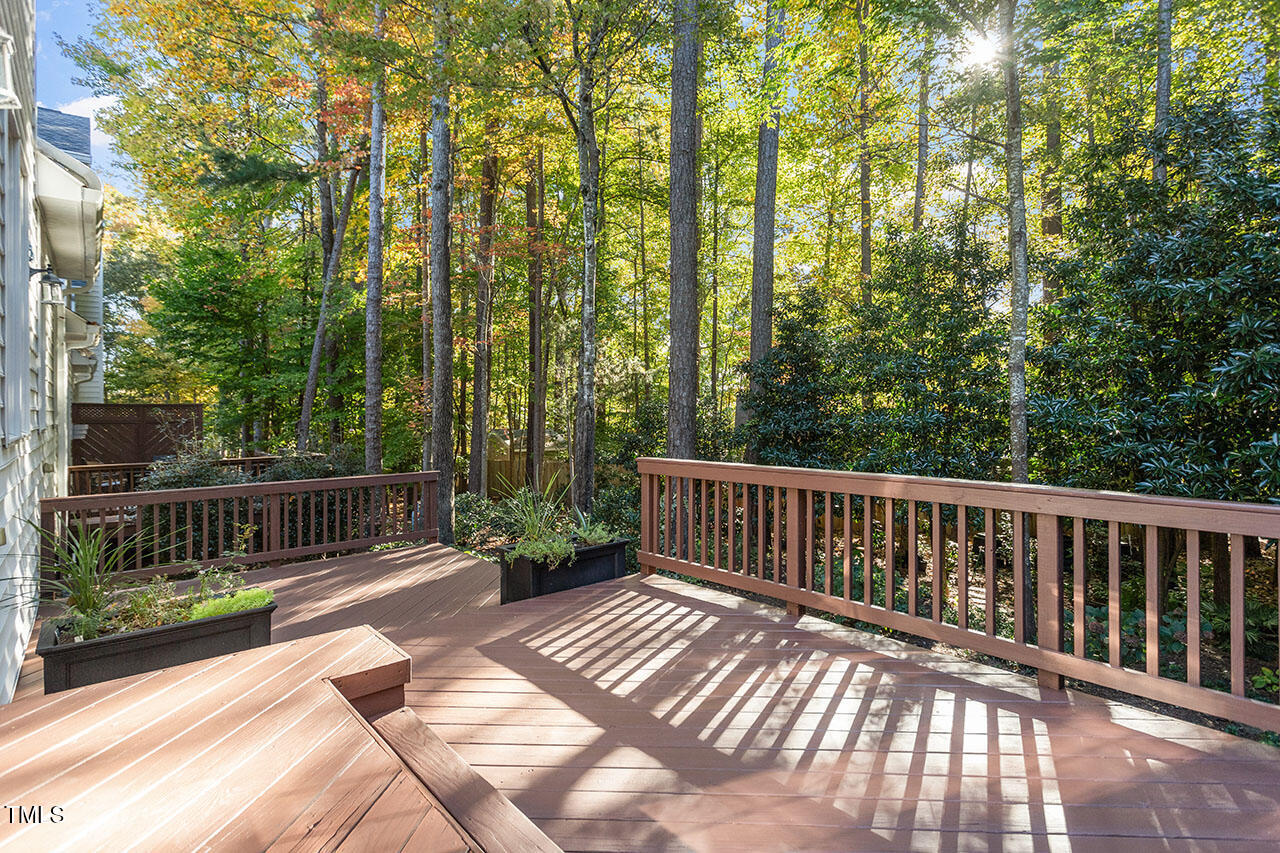 7342 Fontana Ridge Lane Raleigh, NC 27613 - Photo 22 of 26 a view of balcony with wooden floor and outdoor space