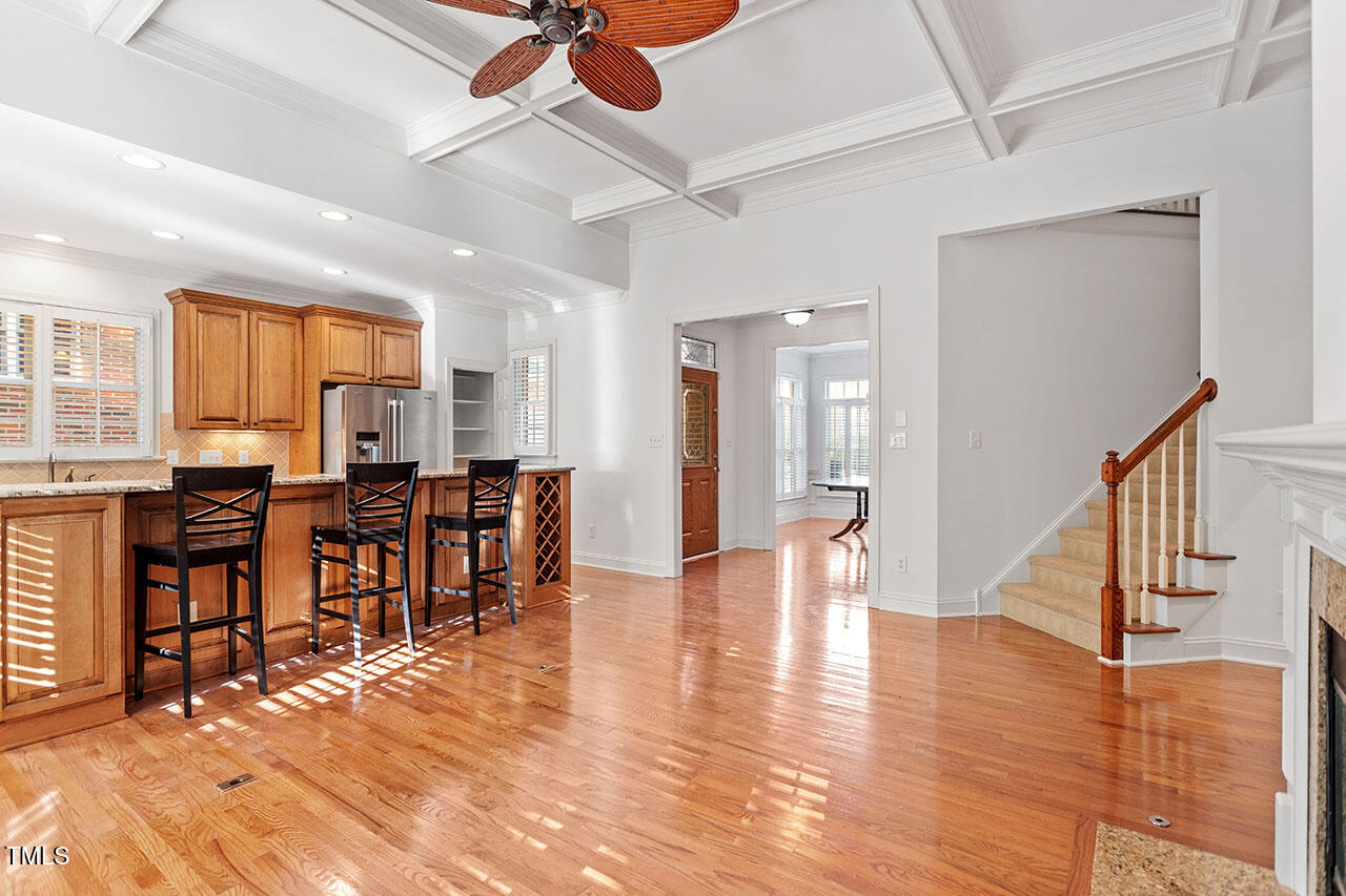 7342 Fontana Ridge Lane Raleigh, NC 27613 - Photo 6 of 26 a view of a dining room with furniture and wooden floor