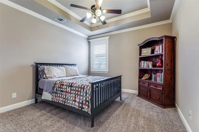a bedroom with a bed and closet