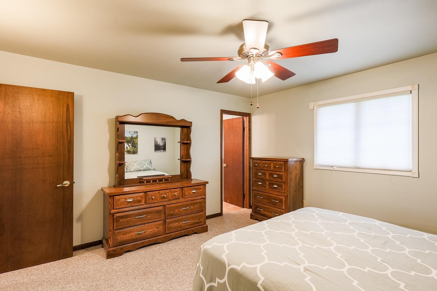 2419 Flat Rock Road Dyer, IN 46311 - Photo 13 of 21 a bedroom with a bed and a dresser