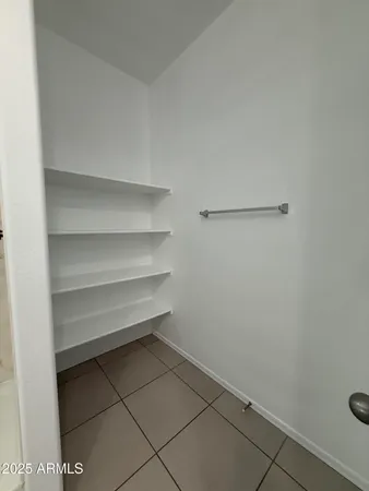 a storage room with washer and dryer