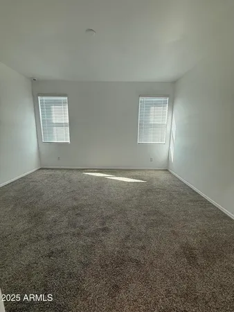 a living room with a bed
