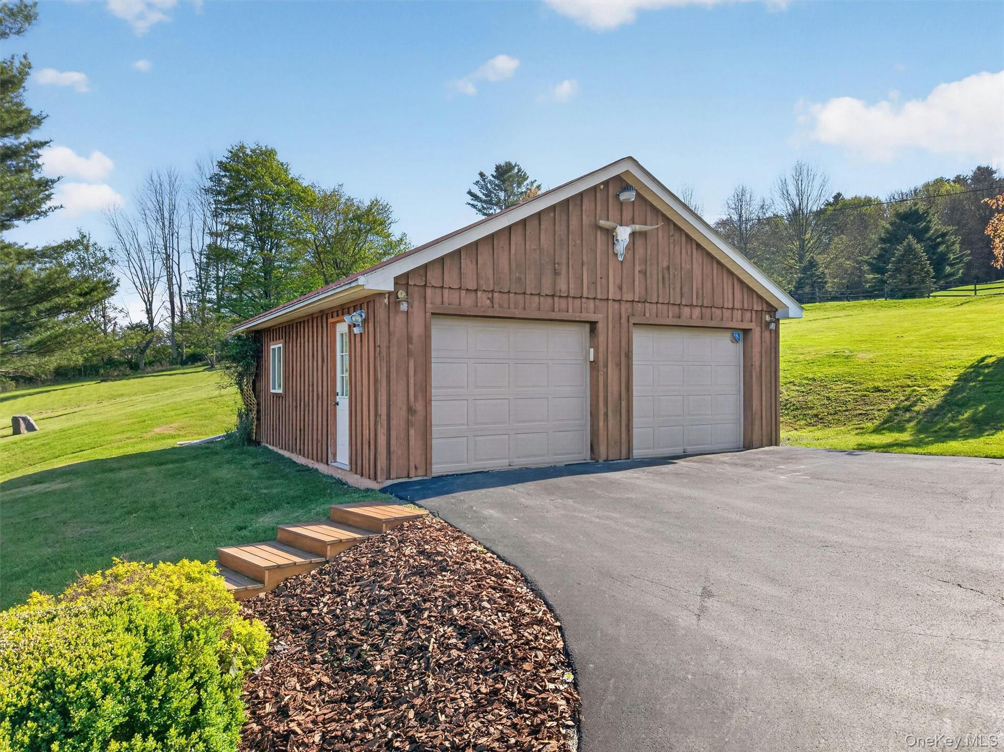 340 Hospital Road Callicoon, NY 12723 - Photo 37 of 41 a view of a house with a yard