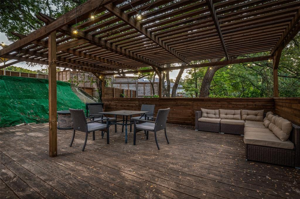 11211 McCree Road Dallas, TX 75238 - Photo 24 of 29 a view of a chairs and table in the patio
