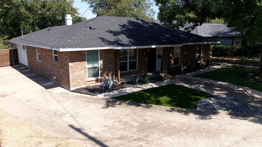 11211 McCree Road Dallas, TX 75238 - Photo 26 of 29 a view of house with yard and outdoor seating