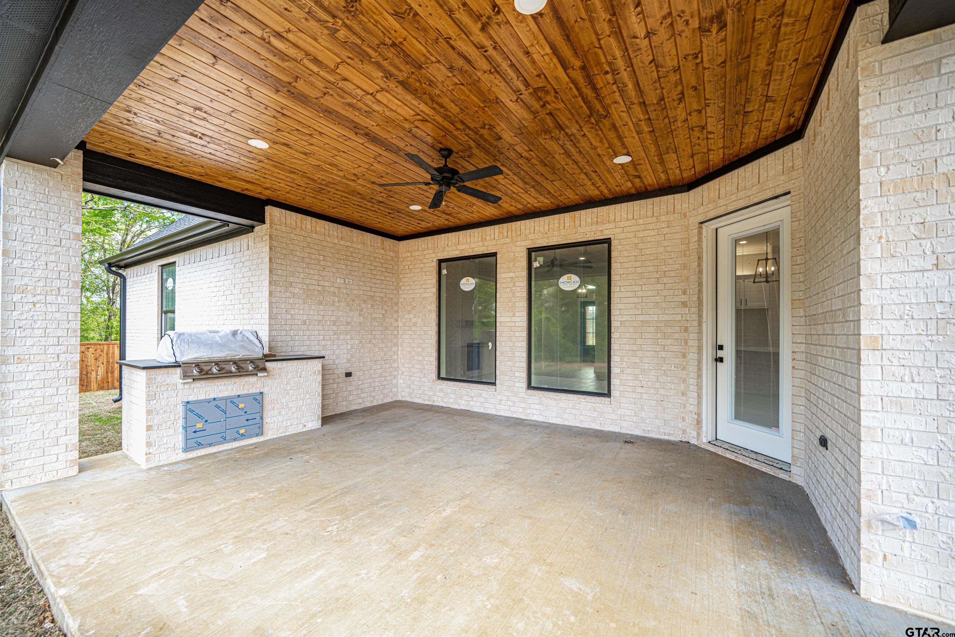 3910 Hidden Hills Circle Longview, TX 75605 - Photo 32 of 39 a view of an empty room with a kitchen