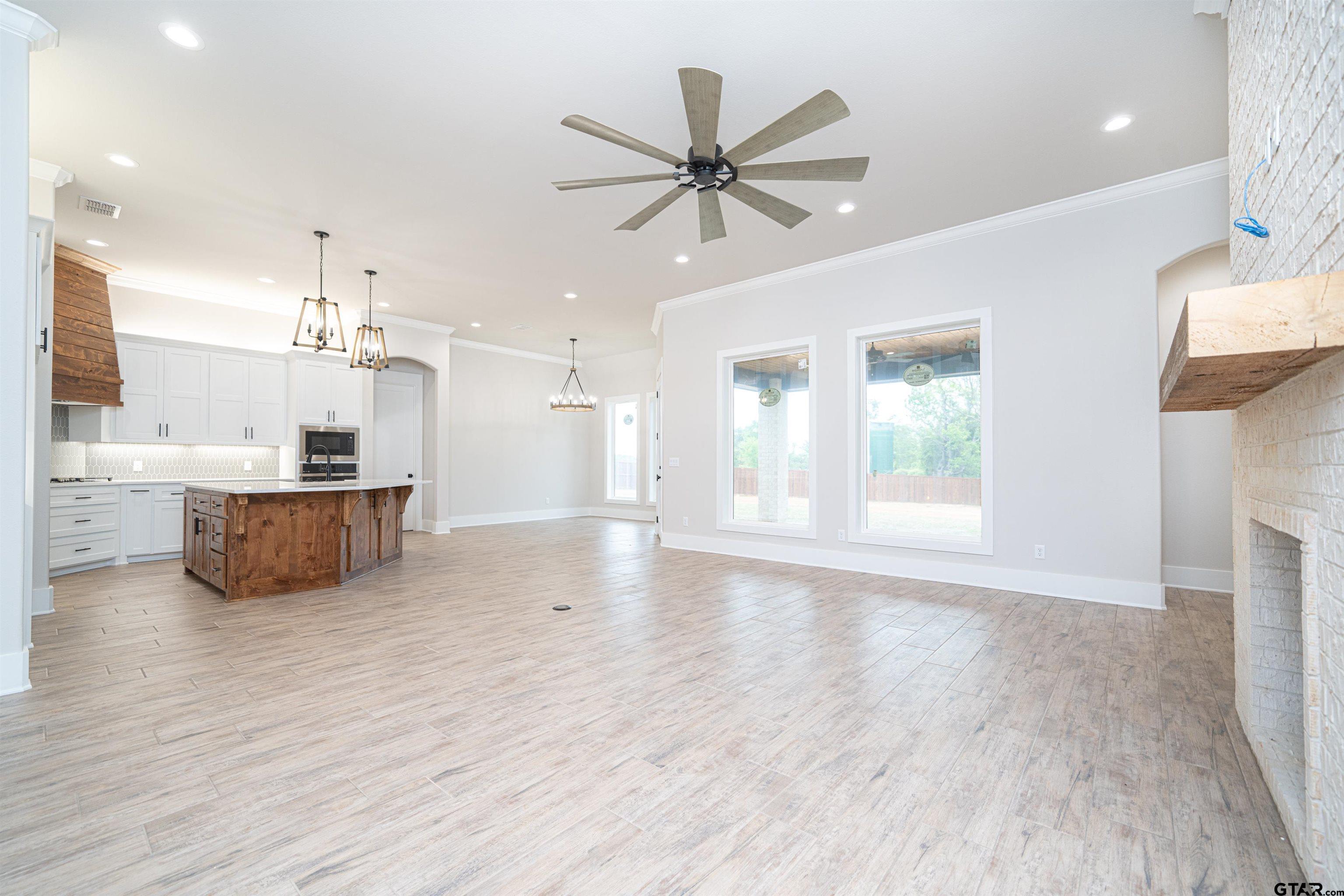 3910 Hidden Hills Circle Longview, TX 75605 - Photo 7 of 39 a view of a kitchen with a sink and a window