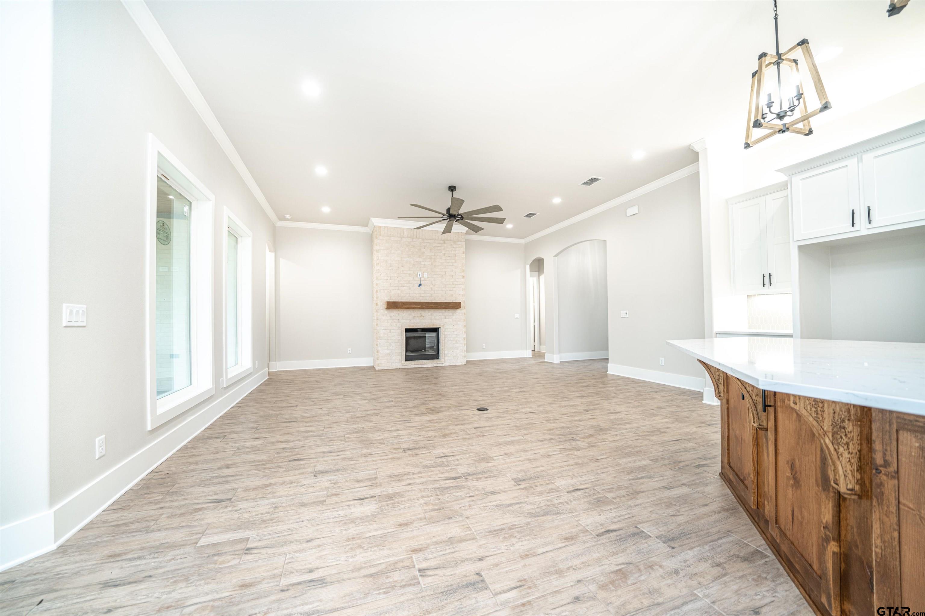 3910 Hidden Hills Circle Longview, TX 75605 - Photo 10 of 39 a view of a kitchen with a sink and a kitchen view