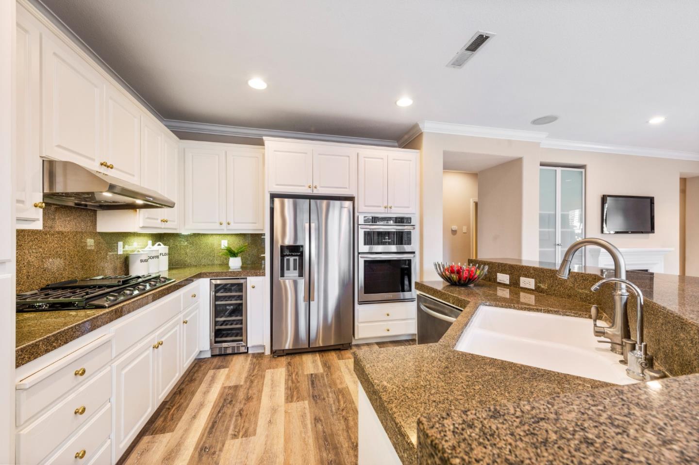274 Primrose Drive San Jose, CA 95123 - Photo 11 of 30 a kitchen with stainless steel appliances a sink stove and refrigerator