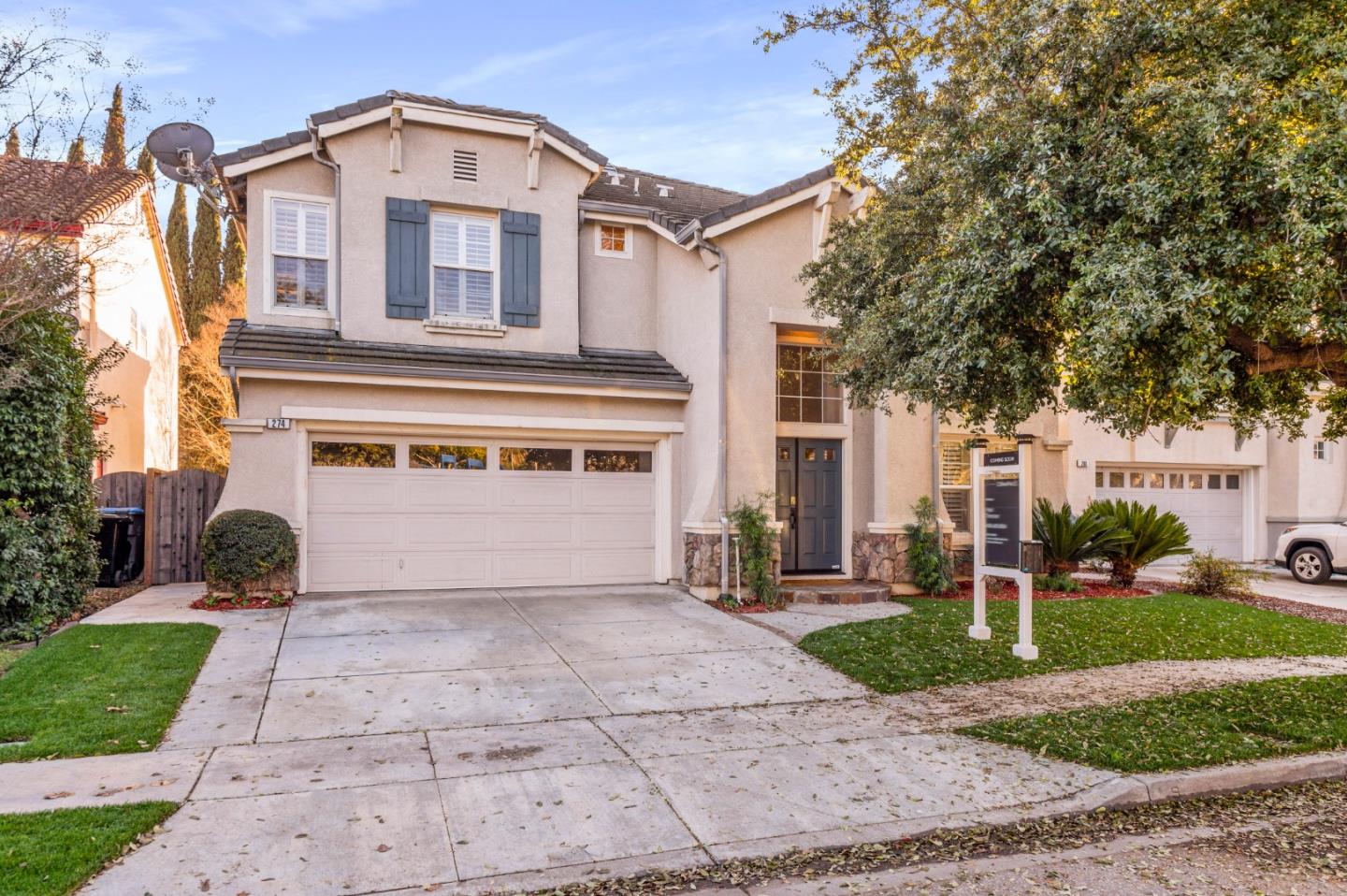 274 Primrose Drive San Jose, CA 95123 - Photo 2 of 30 a front view of a house with a yard and garage