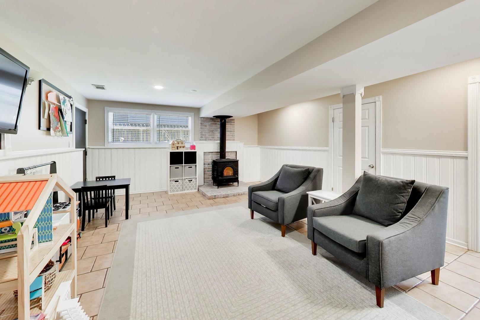 44 Swift Lane Naperville, IL 60565 - Photo 12 of 37 a living room with furniture and a couch