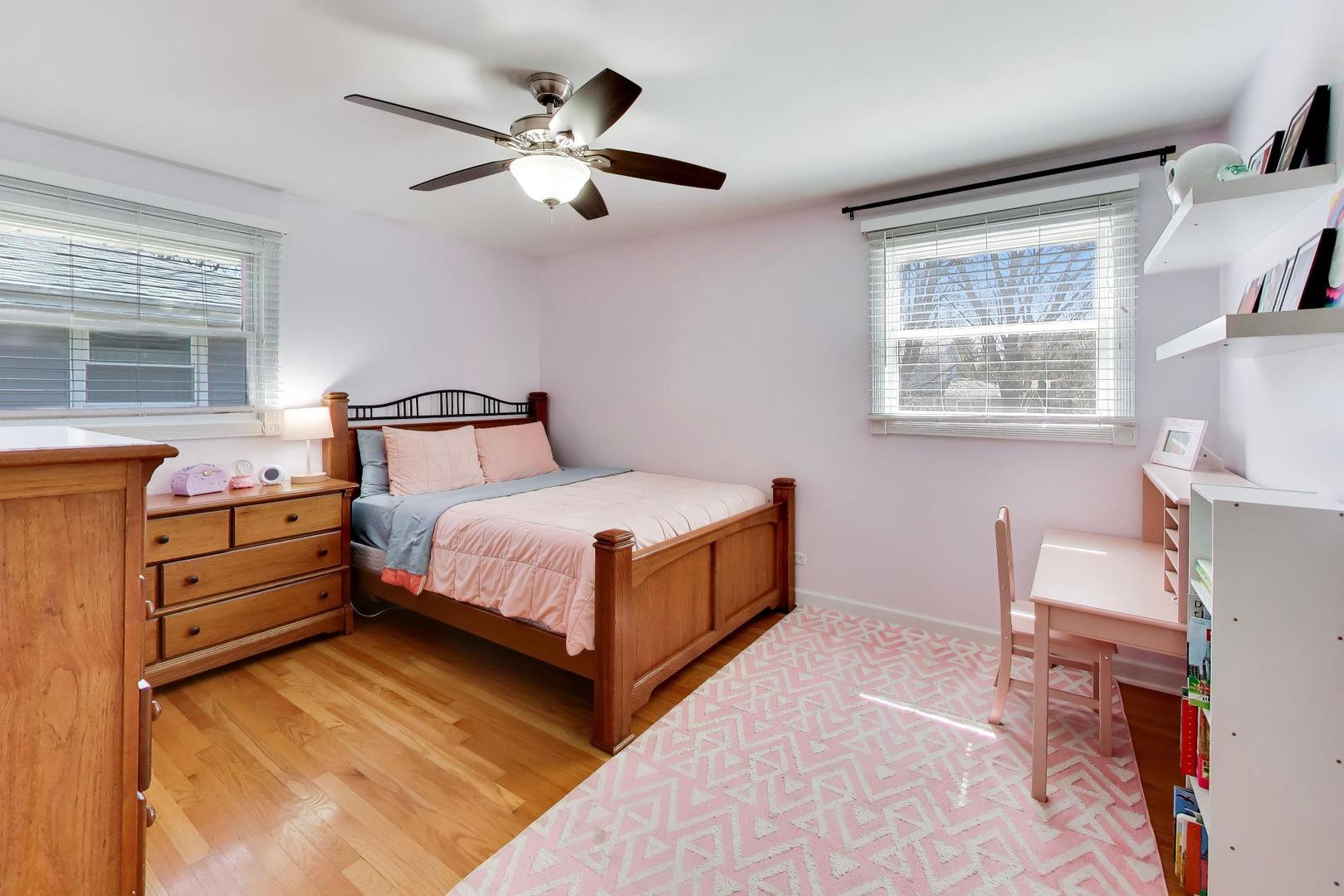 44 Swift Lane Naperville, IL 60565 - Photo 14 of 37 a bedroom with a bed and window