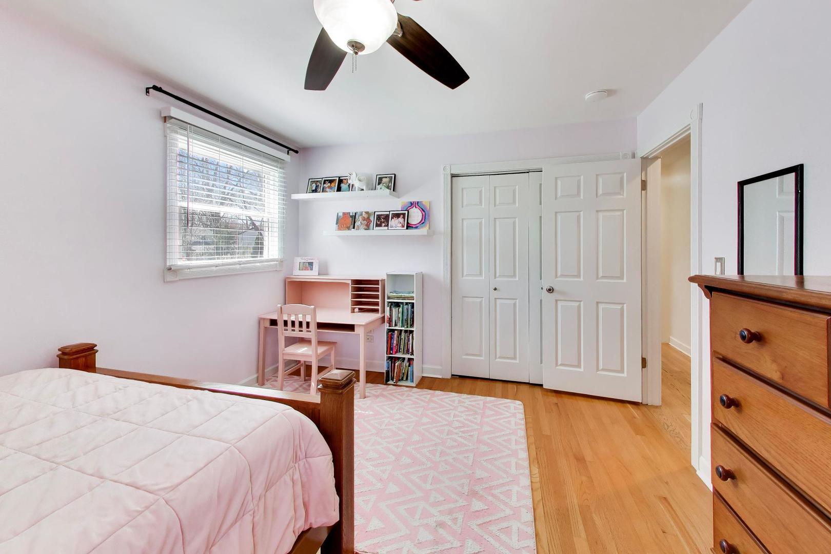 44 Swift Lane Naperville, IL 60565 - Photo 15 of 37 a bed room with a bed and a window