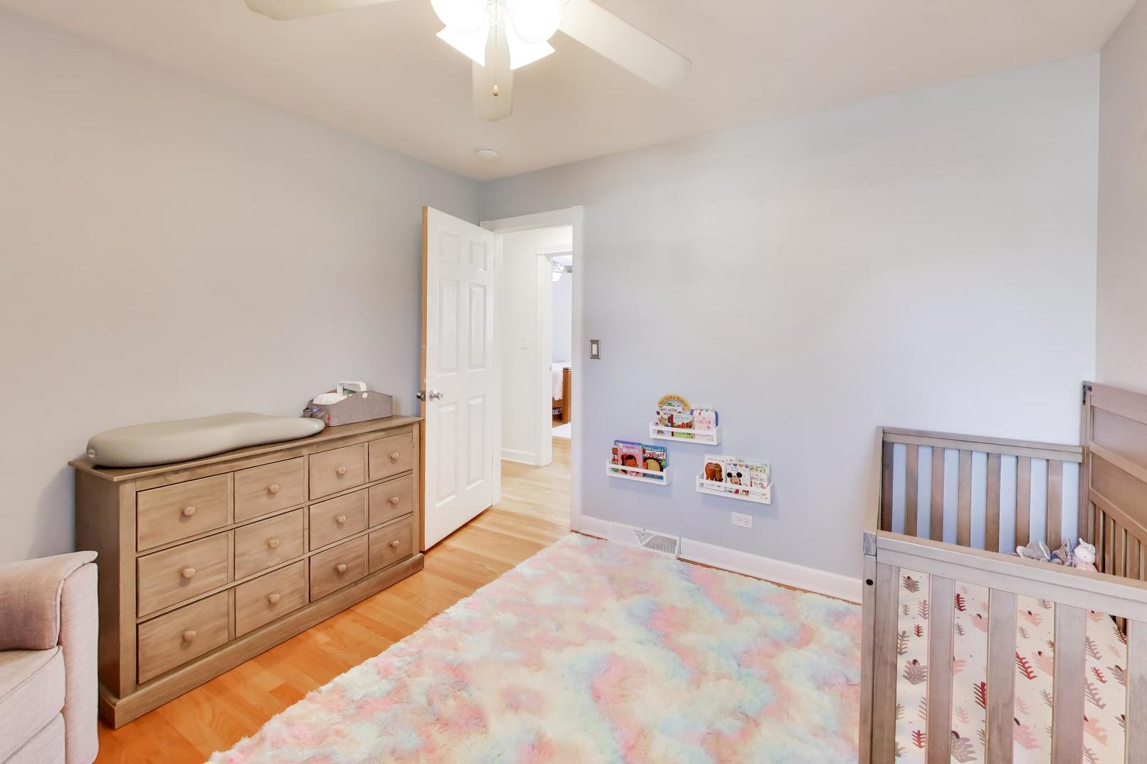 44 Swift Lane Naperville, IL 60565 - Photo 17 of 37 a large white bed in a white bedroom