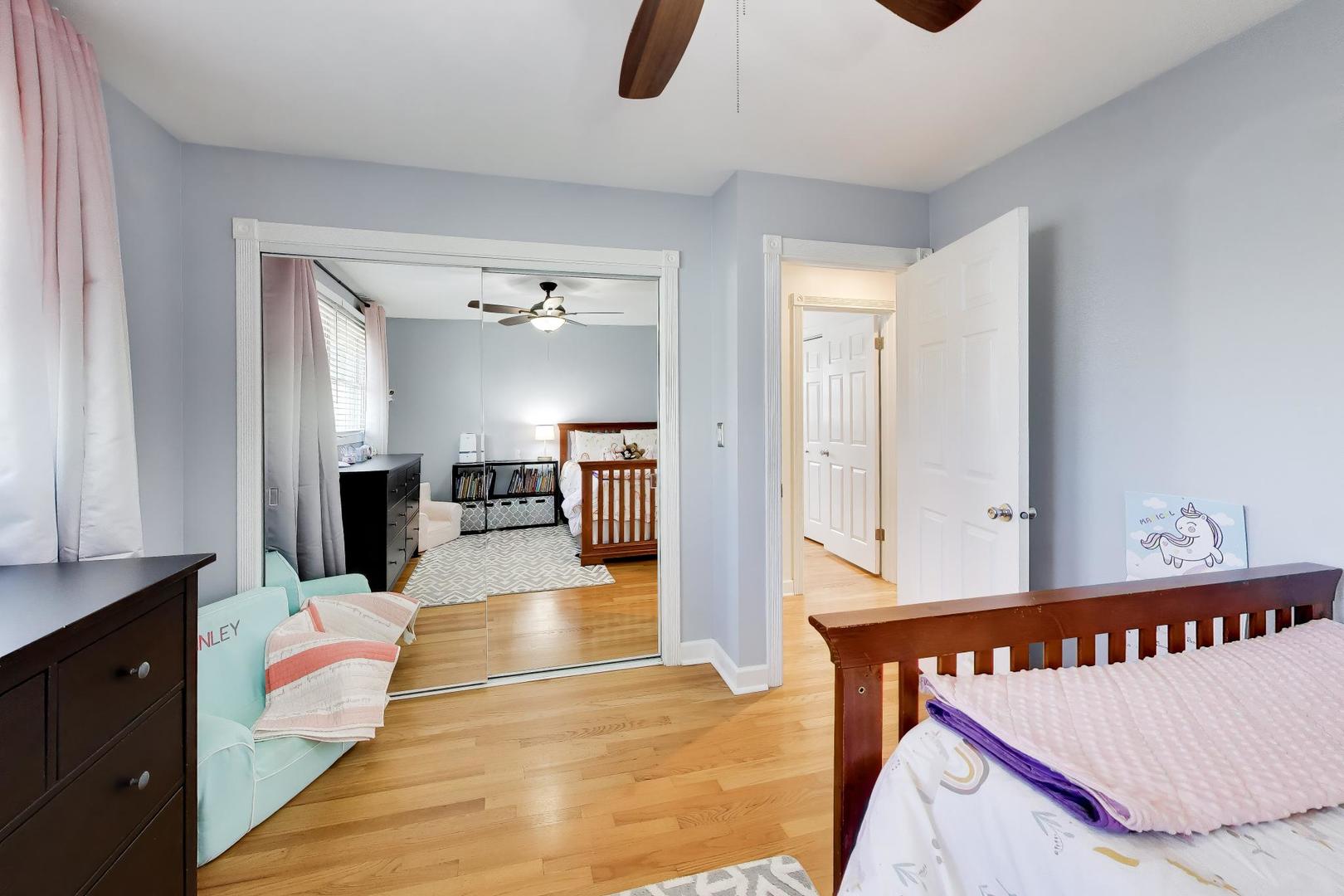 44 Swift Lane Naperville, IL 60565 - Photo 19 of 37 a bedroom with furniture and window