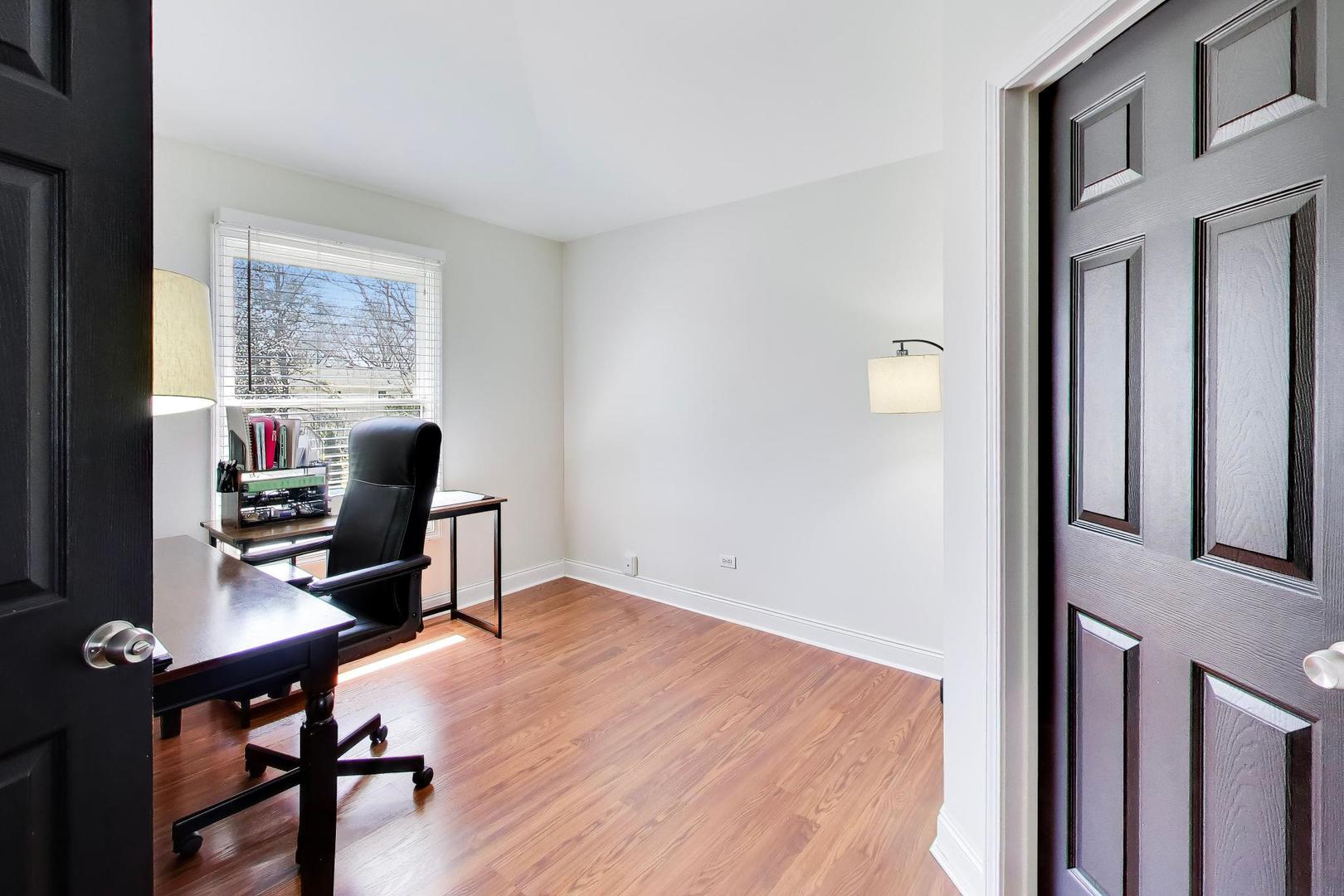 44 Swift Lane Naperville, IL 60565 - Photo 25 of 37 a view of a workspace with furniture and a window