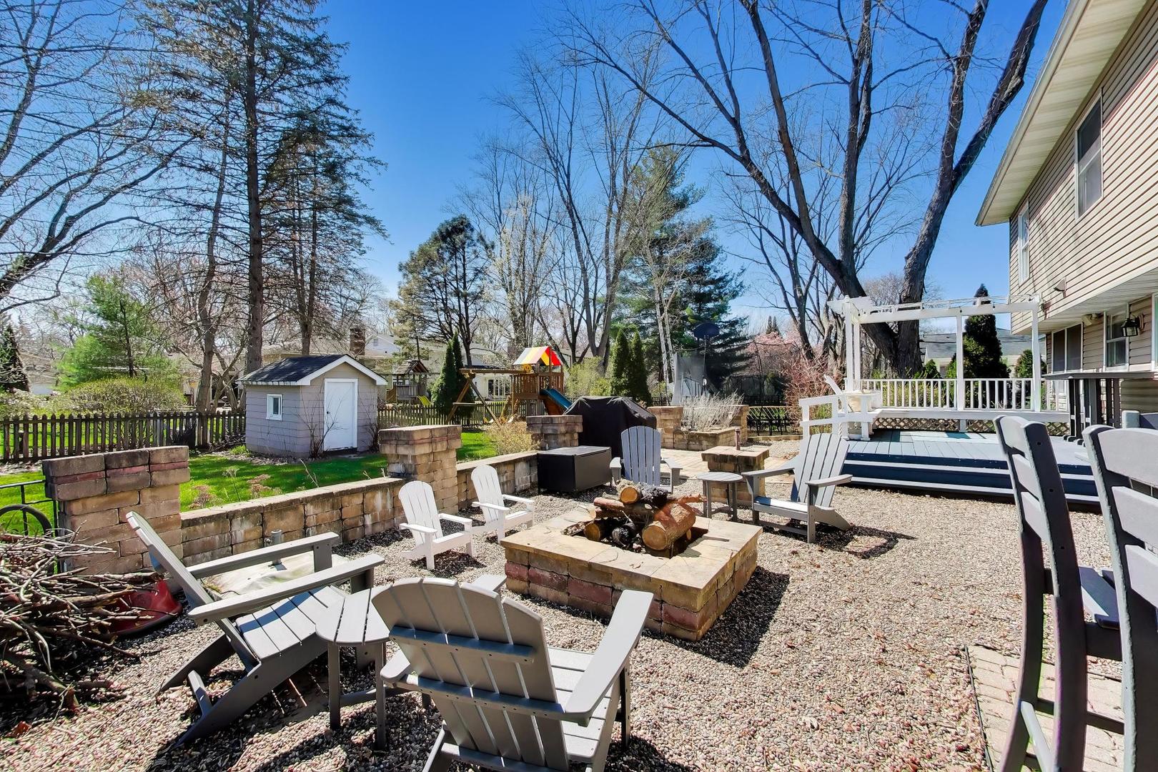 44 Swift Lane Naperville, IL 60565 - Photo 35 of 37 a view of a patio with iron fence