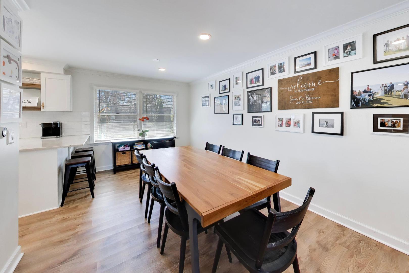 44 Swift Lane Naperville, IL 60565 - Photo 5 of 37 a view of a dining room with furniture and wooden floor