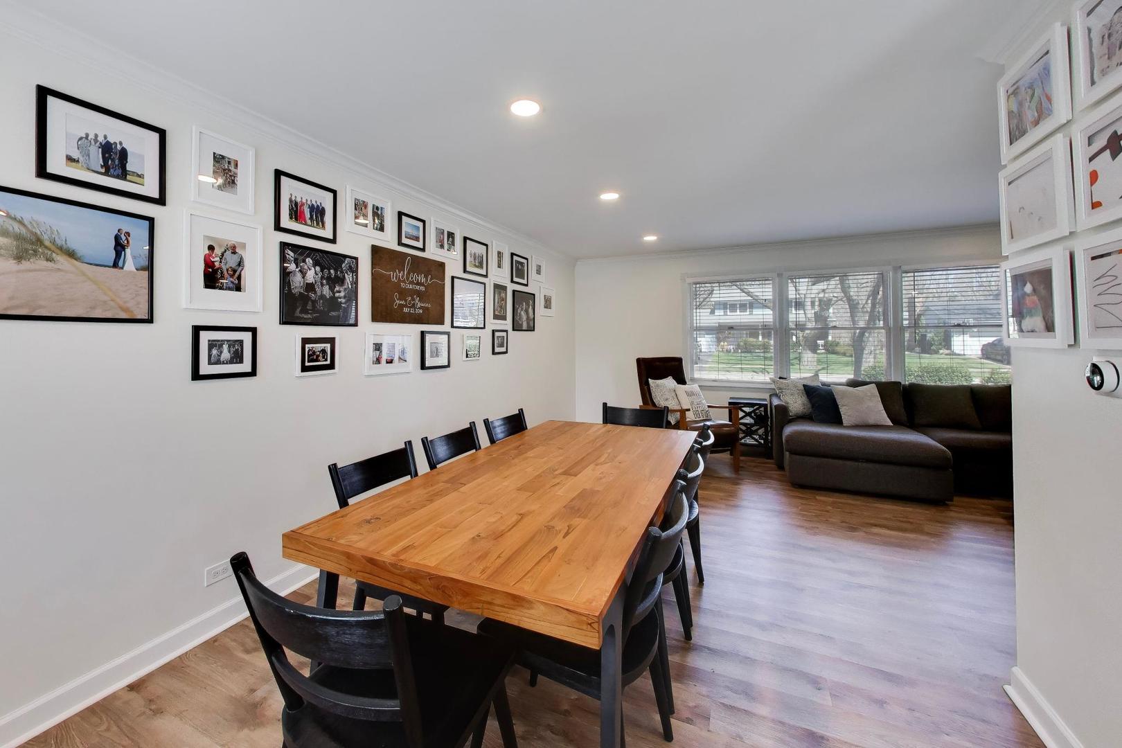 44 Swift Lane Naperville, IL 60565 - Photo 6 of 37 a living room with furniture and a large window