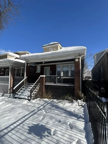 a view of a house with a roof deck