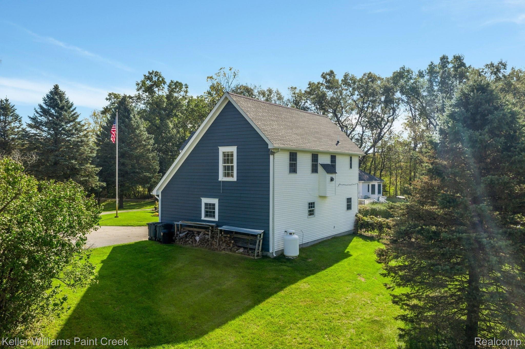115 Michael Road Lapeer, MI 48446 - Photo 55 of 64 High End Blue Craneboard Solid Core Siding (with built-in Insulation) installed in 2017. Extra Boards will be left in the Barn