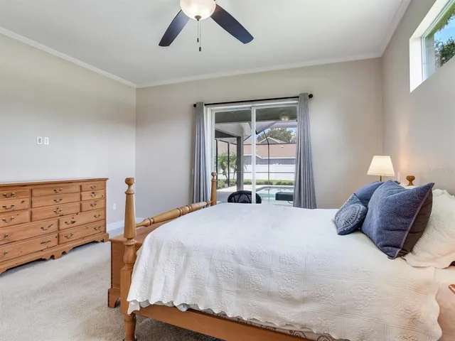 a view of a livingroom with couch and a window