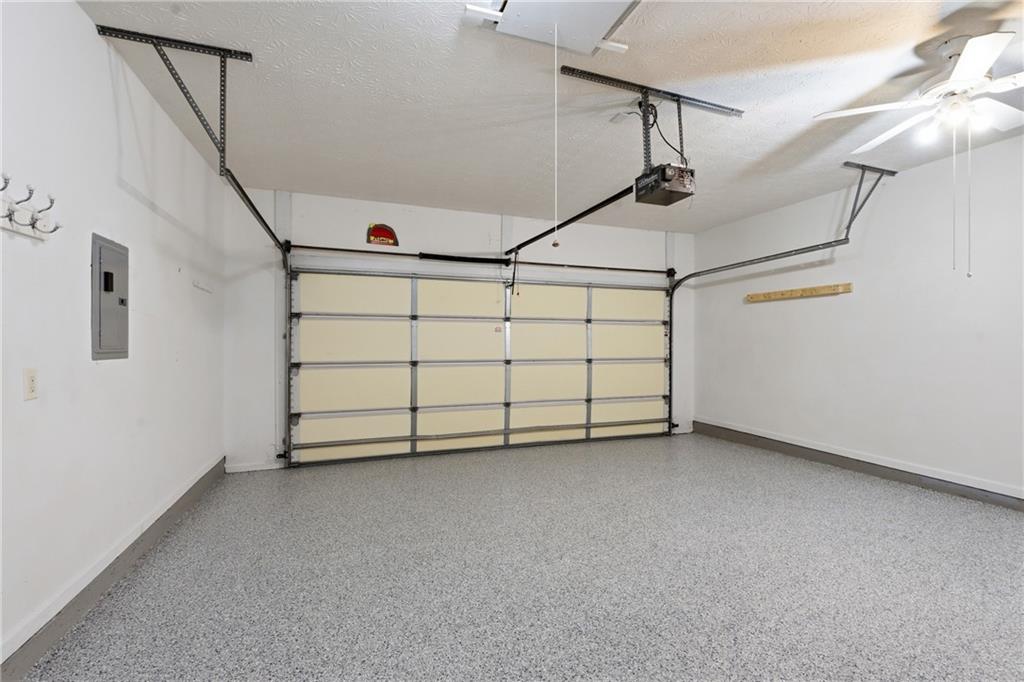 4533 Caleb Crossing, Unit 18 Powder Springs, GA 30127 - Photo 22 of 24 a view of a garage