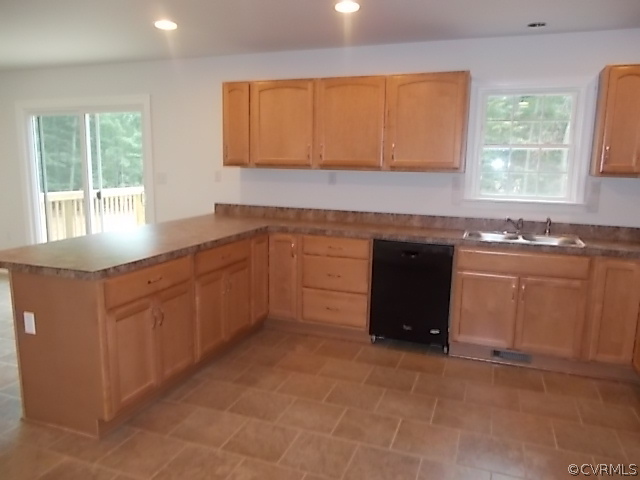 102 Jacoby Road Louisa, VA 23093 - Photo 4 of 24 a kitchen with sink cabinets and window