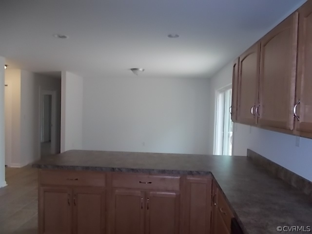 102 Jacoby Road Louisa, VA 23093 - Photo 6 of 24 a view of cabinets and wooden floor