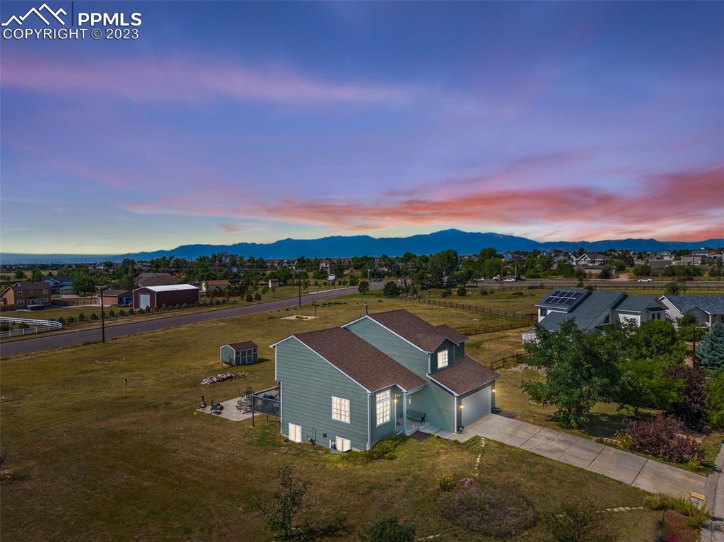 a view of a lake with a building in the background