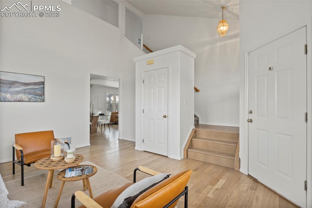 11916 Bonifay Loop Peyton, CO 80831 - Photo 6 of 42 a living room with furniture and a table