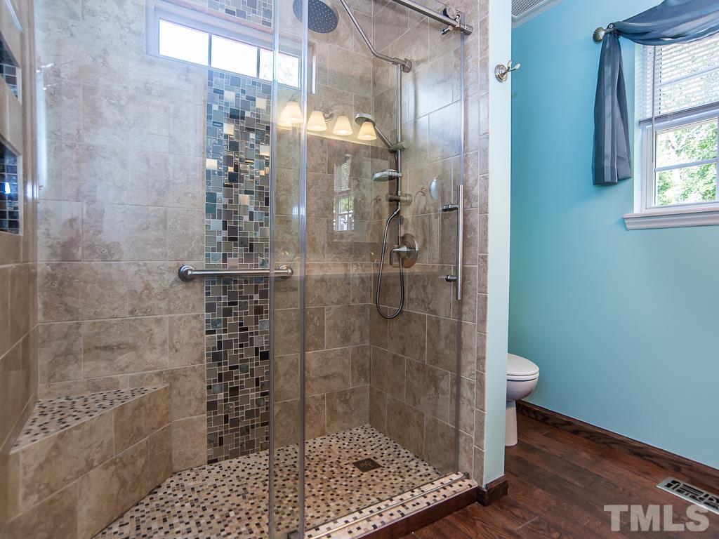 4217 Mardela Spring Drive Raleigh, NC 27616 - Photo 16 of 26 a bathroom with a shower
