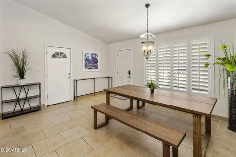 a reading room with furniture and window