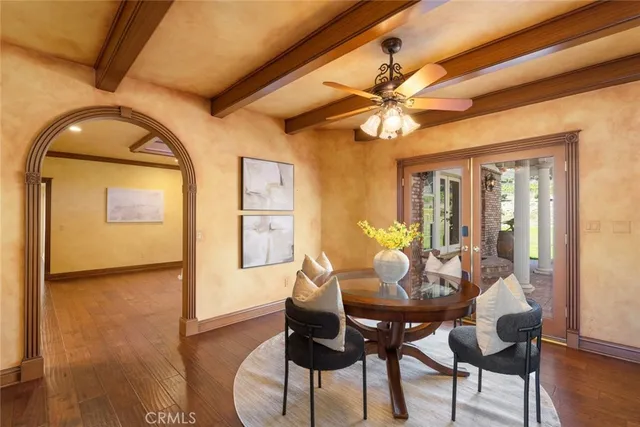 a bed room with bed and large window