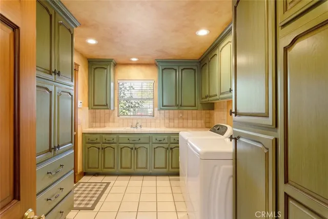 a spacious bedroom with a bed and a couch