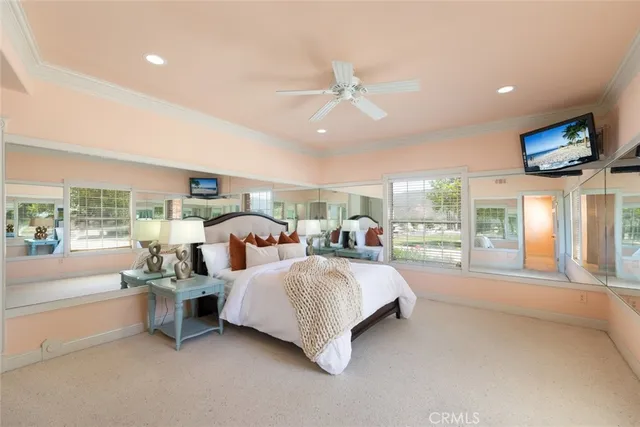 a view of a house with a big yard and large trees
